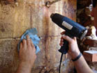 Using a heat gun to remove beeswax