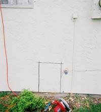 Cutting open stucco wall